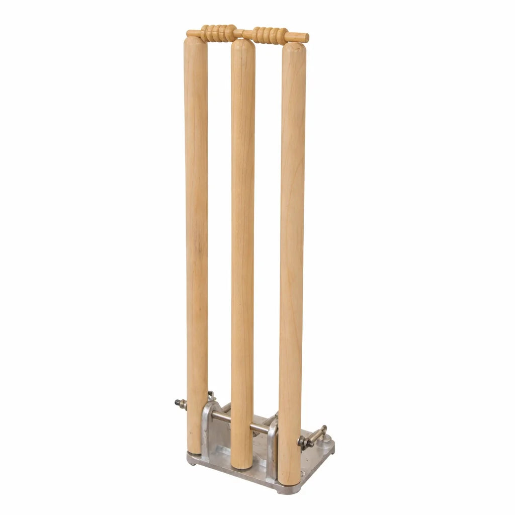 Close-up view of the heavy-duty black cast iron spring-back base and dual tension springs of the CA Cricket Stumps set.