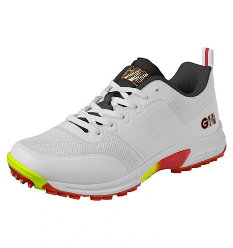 Front angular view of GM Rival All Rounder cricket shoe in white with red and yellow sole at Alberta Cricket Store