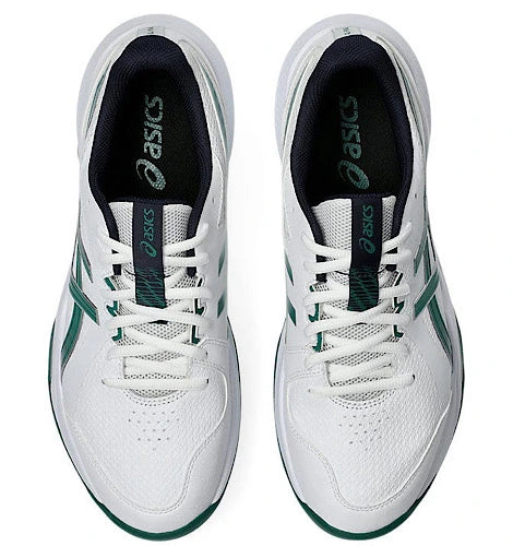 Direct top-down overhead view of a pair of white and green Asics Gel-Peake 3 cricket shoes displaying lacing system and tongue branding