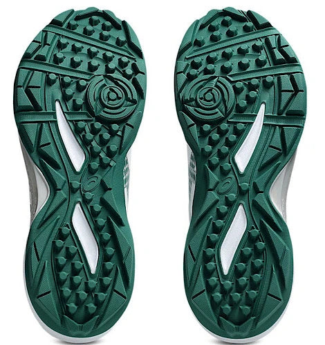 Bottom outsole view of Asics cricket shoes featuring a green high-traction studded rubber sole pattern.
