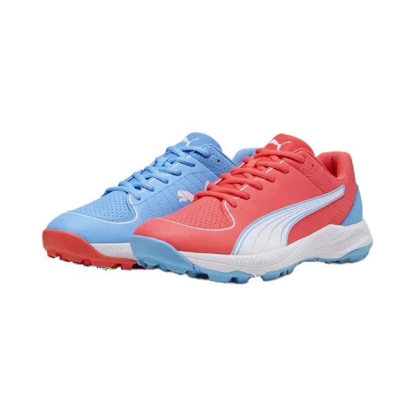 Pair of Puma 24 FH Rubber Cricket Shoes in luminous blue and red with white Puma Formstrip accents.