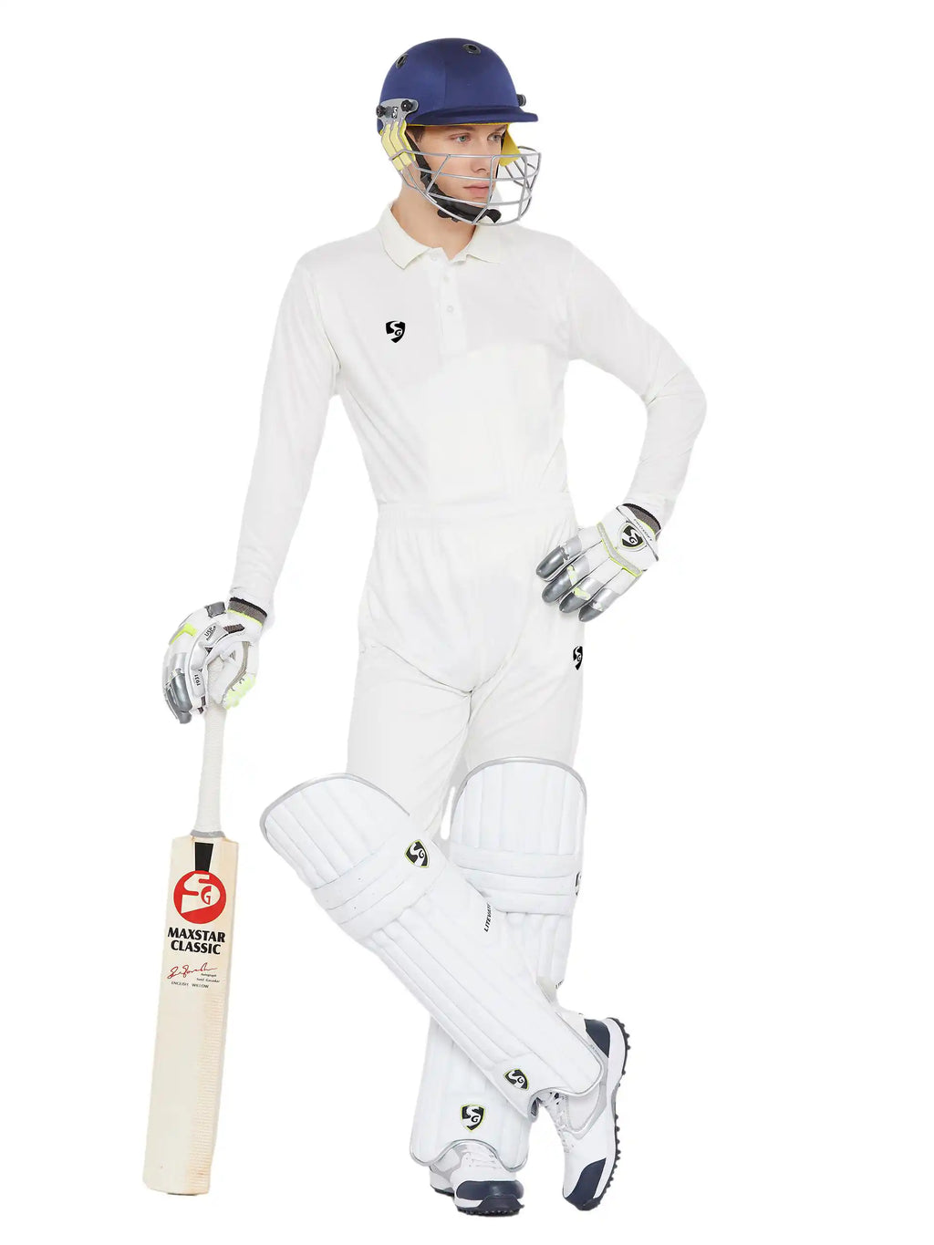 Full length view of a cricketer wearing SG Club full sleeve cricket whites, batting pads, gloves, and helmet while holding a cricket bat.