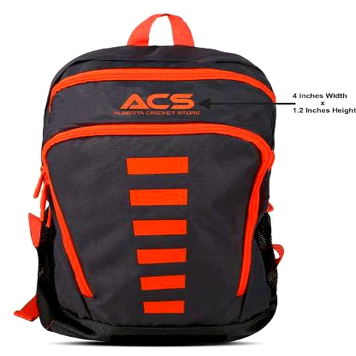 A charcoal grey and vibrant orange ACS Alpha Cricket Backpack showing the front compartments, mesh side pockets, and top carry handle.
