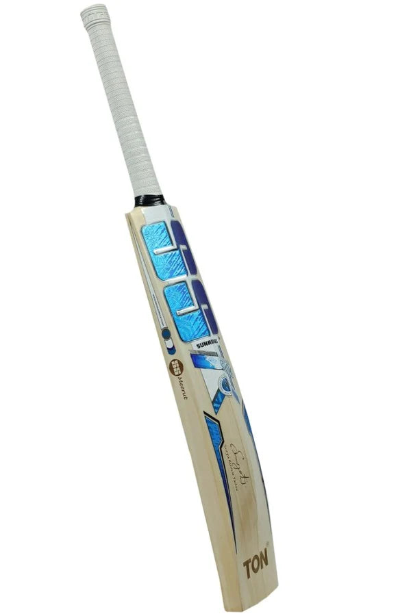 Angled three-quarter back view of SS SKY Flicker English Willow Cricket Bat displaying blue stickers and white rubber handle grip