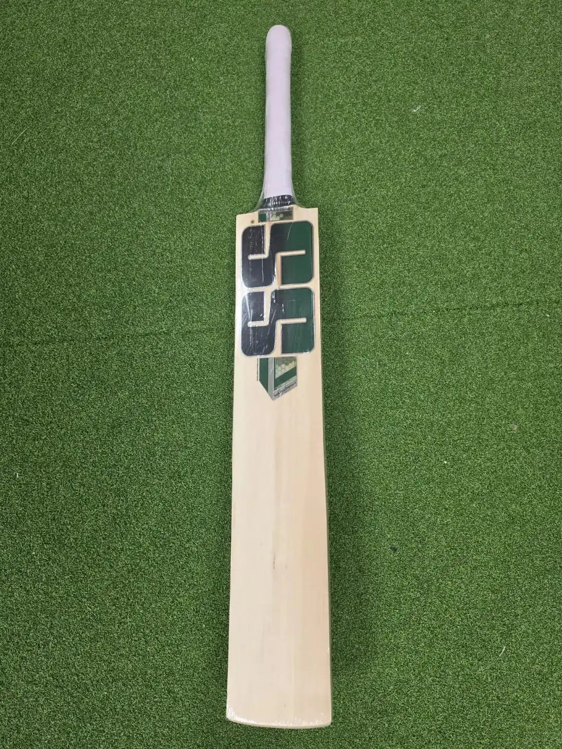 SS Soft Pro cricket bat – front view with green SS branding and white grip