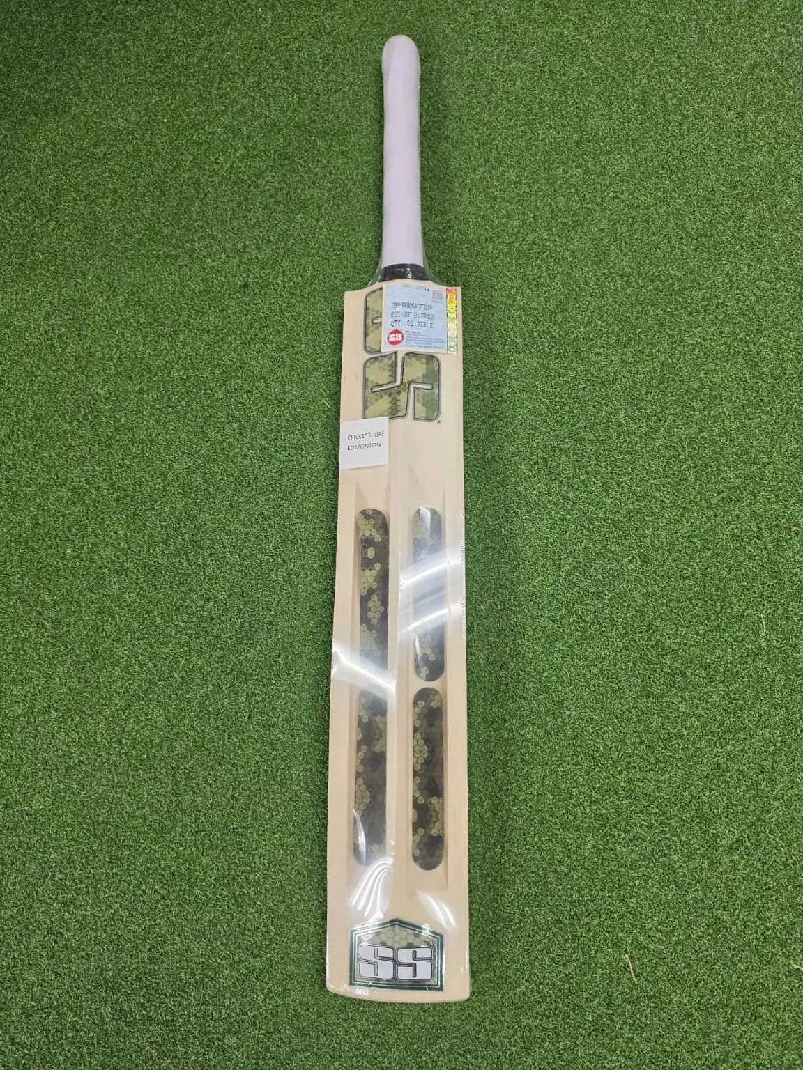 SS Soft Pro cricket bat – full-length view with green branding and white grip